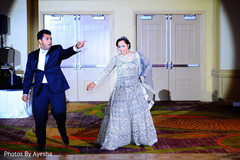 Indian groom and Indian bride starting their performance in reception. Indian groom and Indian bride starting their performance in reception.