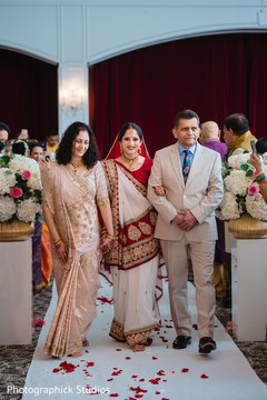 Indian bride walking in to her wedding ceremony. Indian bride walking in to her wedding ceremony.