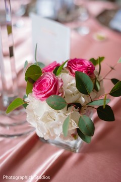 Indian wedding pink roses and white Hydrangea table centerpiece. Indian wedding pink roses and white Hydrangea table centerpiece.