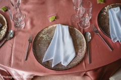 Indian wedding golden table plates. Indian wedding golden table plates.
