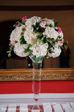 Escort cards Indian wedding table flowers decoration. Escort cards Indian wedding table flowers decoration.