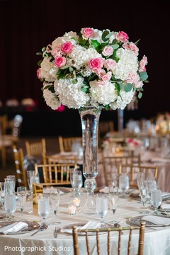White and pink flowers for Indian wedding table centerpiece. White and pink flowers for Indian wedding table centerpiece.