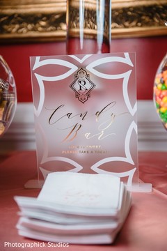 Indian wedding clear white and golden candy bar sign. Indian wedding clear white and golden candy bar sign.