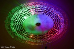 Indian engagement green and pink colors on chandelier. Indian engagement green and pink colors on chandelier.