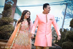 Peach color Indian couples engagement fashion. Peach color Indian couples engagement fashion.