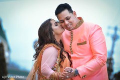 Indian bride kissing her Indian groom capture. Indian bride kissing her Indian groom capture.