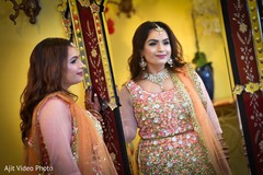 Indian bride's pink, peach and white flowers for lehenga decor. Indian bride's pink, peach and white flowers for lehenga decor.