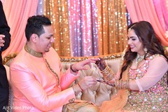 Indian couple exchanging engagement rings. Indian couple exchanging engagement rings.
