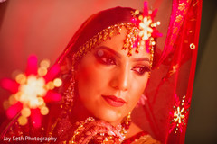 Maharani behind the red veil. Maharani behind the red veil.