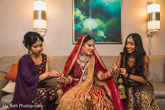 Maharani being assisted by her bridesmaids. Maharani being assisted by her bridesmaids.