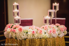 Table center decoration with flowers for Hindu wedding. Table center decoration with flowers for Hindu wedding.