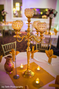Golden chandelier used as table decoration. Golden chandelier used as table decoration.