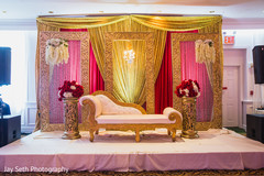 Flower and golden decorated stage for hindu reception. Flower and golden decorated stage for hindu reception.