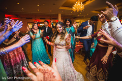 Indian bride dancing in the reception party. Indian bride dancing in the reception party.