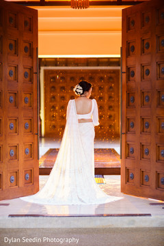 Back design of Maharani's white bridal saree. Back design of Maharani's white bridal saree.
