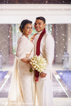 Portrait of the Indian newlyweds wearing traditional attires. Portrait of the Indian newlyweds wearing traditional attires.