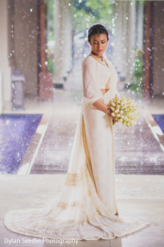 Maharani posing for pictures holding the bouquet. Maharani posing for pictures holding the bouquet.
