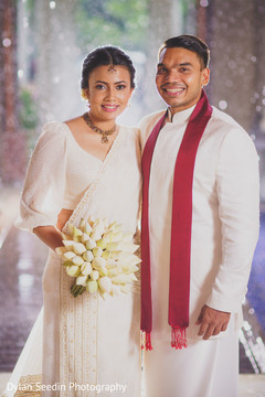 Indian bride and groom wearing traditional wedding attires. Indian bride and groom wearing traditional wedding attires.
