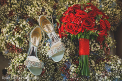Details of Indian bride's shoes and bouquet. Details of Indian bride's shoes and bouquet.