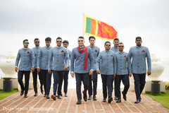 Raja during the photoshoot with groomsmen. Raja during the photoshoot with groomsmen.