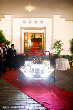 Indian couple's ride floral decor details. Indian couple's ride floral decor details.