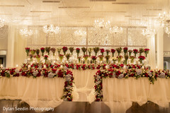 Flower decorated altar with chandeliers. Flower decorated altar with chandeliers.