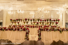 Flower decorated altar with chandeliers. Flower decorated altar with chandeliers.