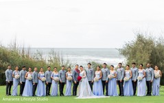 Indian couple during their photo session with groomsmen. Indian couple during their photo session with groomsmen.