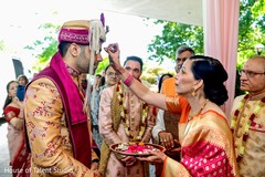 Indian groom being greeted by maharani's relatives Indian groom being greeted by maharani's relatives