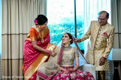 Maharani being admired by her parents. Maharani being admired by her parents.