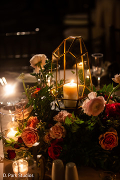 Golden modern lantern as centerpiece decoration for Indian wedding. Golden modern lantern as centerpiece decoration for Indian wedding.