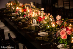 Indian wedding rectangle wood table roses decorations. Indian wedding rectangle wood table roses decorations.