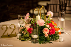 Elegant Indian wedding table roses centerpiece. Elegant Indian wedding table roses centerpiece.