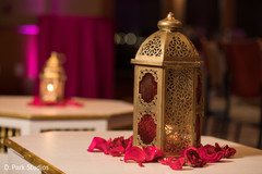 Golden Indian sangeet lantern decorations. Golden Indian sangeet lantern decorations.
