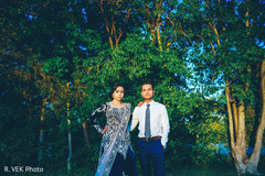 Indian bride and groom outdoors during the photoshoot. Indian bride and groom outdoors during the photoshoot.