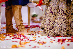 Close up details of the couple during the Saptapadi rituals. Close up details of the couple during the Saptapadi rituals.