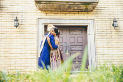 Indian bride and groom hugging each other during their first look. Indian bride and groom hugging each other during their first look.