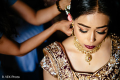 Indian bride's makeup, jewelry and hair details. Indian bride's makeup, jewelry and hair details.