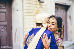 Maharani hugging the Raja during their first look session. Maharani hugging the Raja during their first look session.