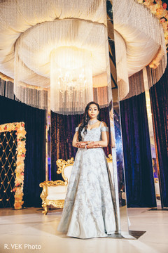 Maharani wearing the white reception lengha with silver embroidery. Maharani wearing the white reception lengha with silver embroidery.