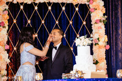 Indian bride sharing a slice of cake with the Raja. Indian bride sharing a slice of cake with the Raja.