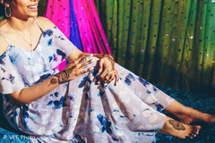 Indian bride's lengha and henna designs. Indian bride's lengha and henna designs.