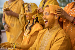 Indian couple cover all over with turmeric paste ritual. Indian couple cover all over with turmeric paste ritual.