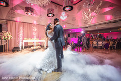 The newlyweds having fun during their first dance The newlyweds having fun during their first dance