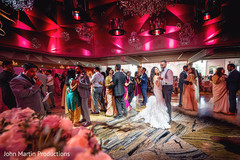 Newlyweds, friends and family on the dance floor Newlyweds, friends and family on the dance floor
