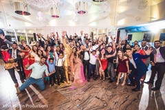 Indian couple with all their guests during reception. Indian couple with all their guests during reception.