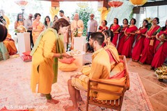 Sweets being offered to the couple Sweets being offered to the couple