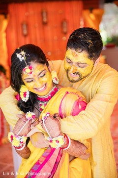 Groom hugging his maharani after the Gaye Halud Groom hugging his maharani after the Gaye Halud