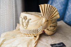 Turban in gold used by Indian groom. Turban in gold used by Indian groom.