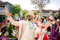 Raja wearing sunglasses and a turban enjoying his baraat. Raja wearing sunglasses and a turban enjoying his baraat.
